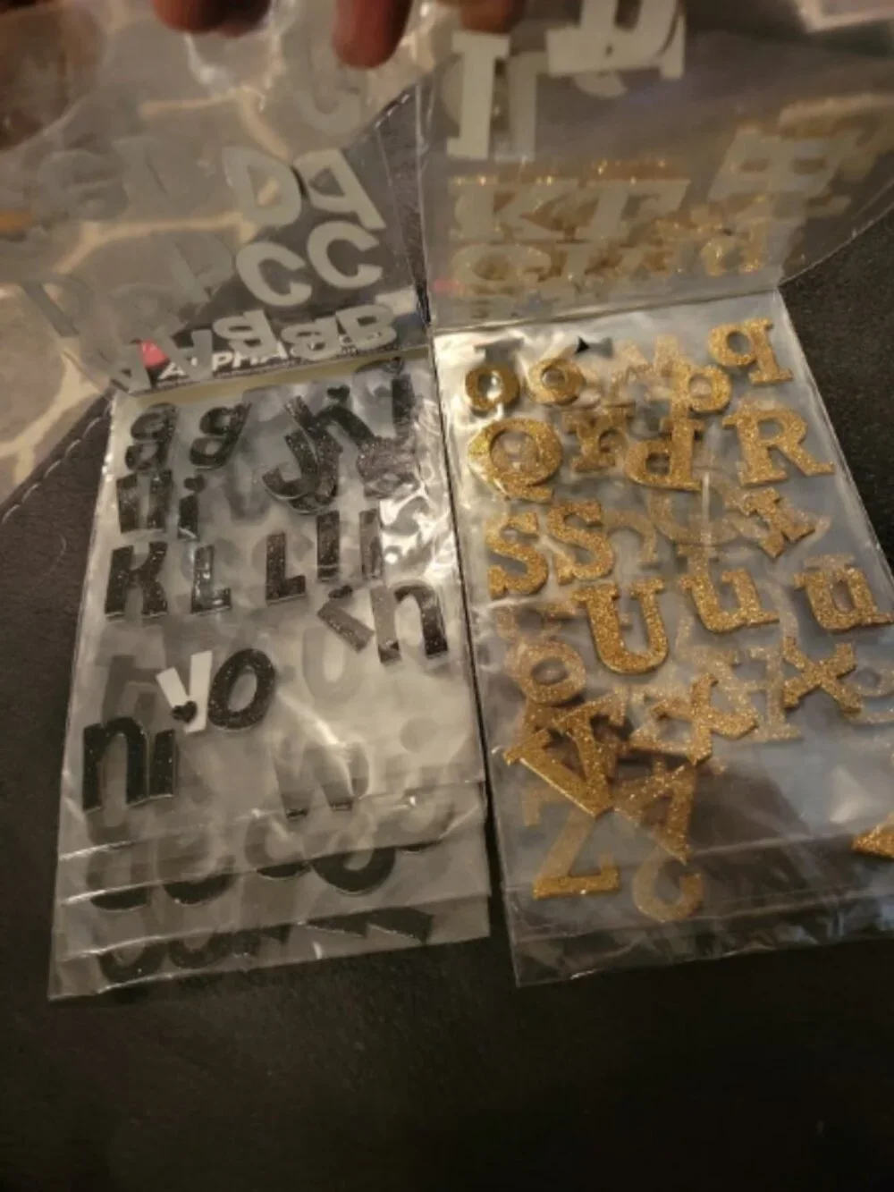 Alpha chips alphabet stockers. Gold and black